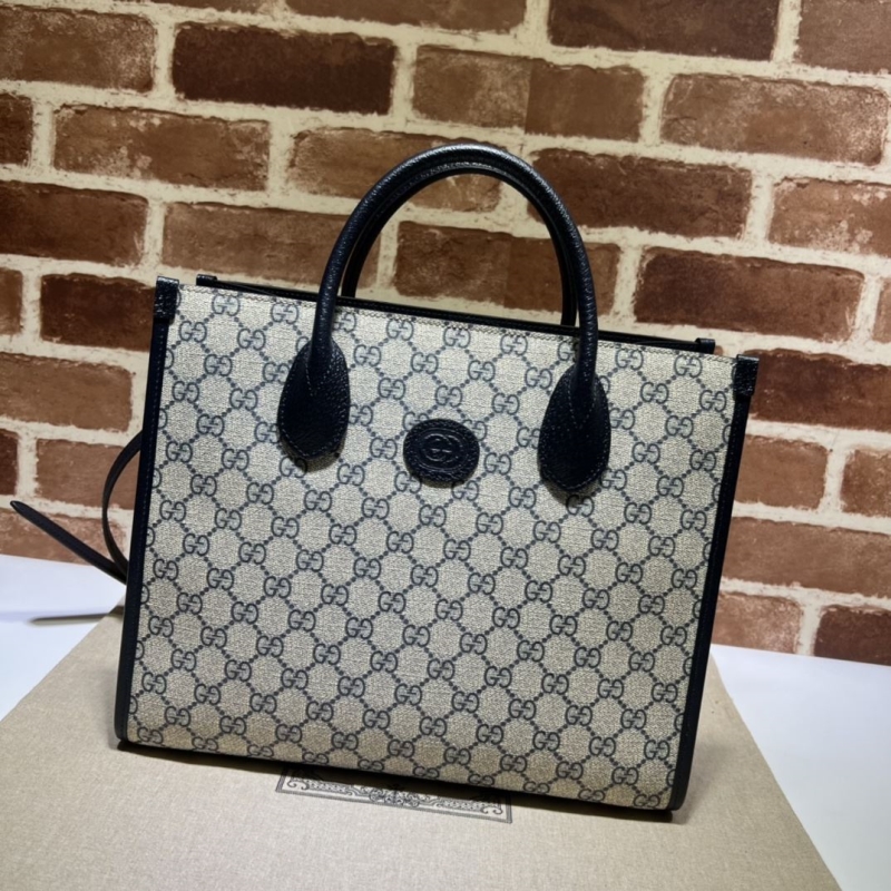 G*u*i shopping bags